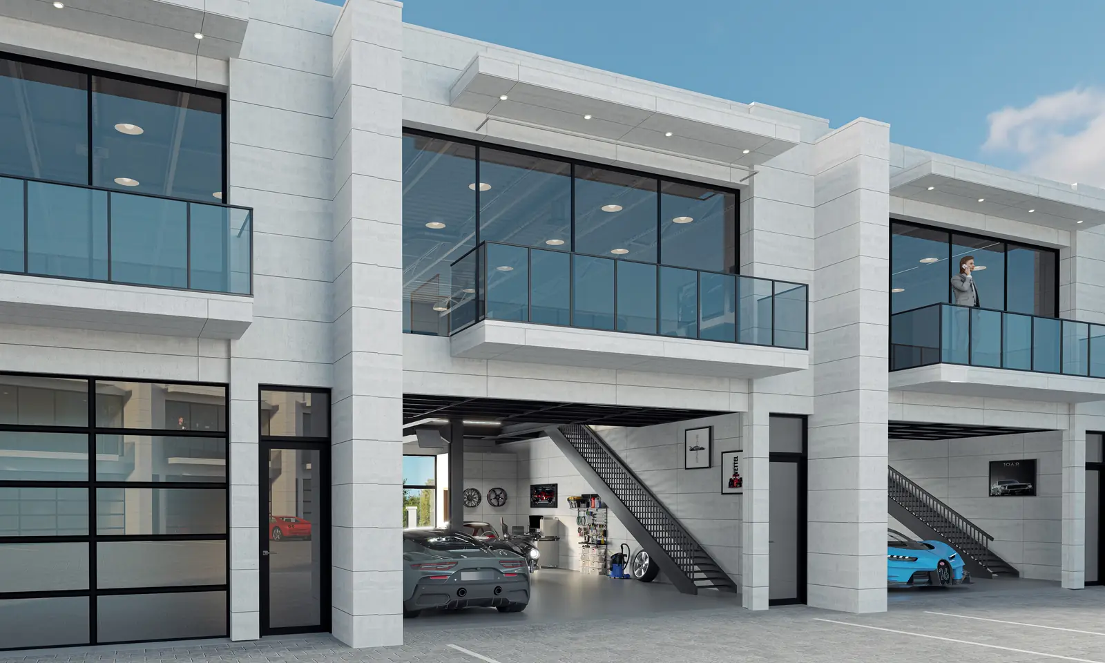 The Garage in West Plano: two-story automotive residences with glass overhead doors and private balconies, and the Coffee Walk pavilion with the Owners Lounge above it.